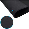Close-up of black fabric with a detailed texture on a white background