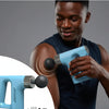 Man using a blue massage gun on his arm against a gray background-shopucart store